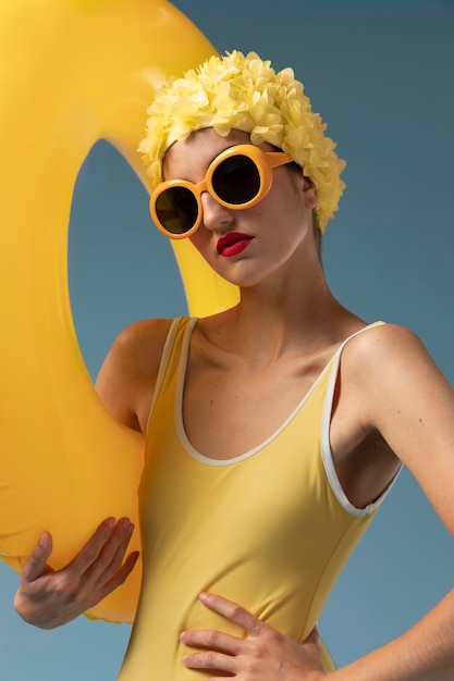 Young woman with swimming cap