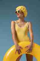 Free photo young woman with swimming cap