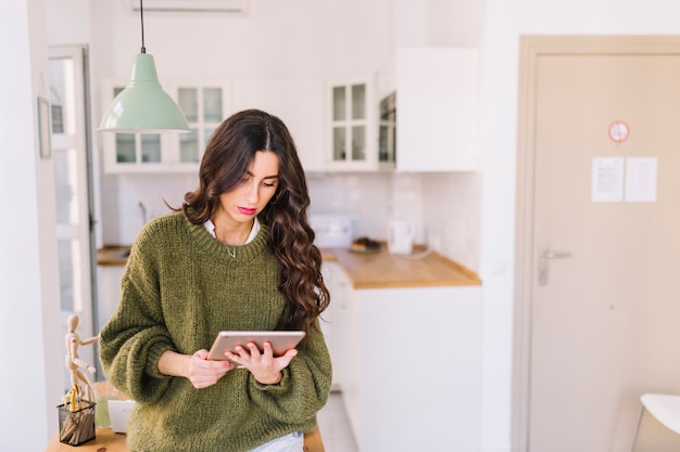 Free photo young woman with tablet