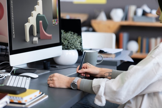 Free photo young woman working in an animation studio