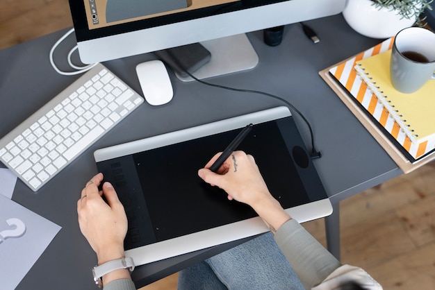 Young woman working in an animation studio