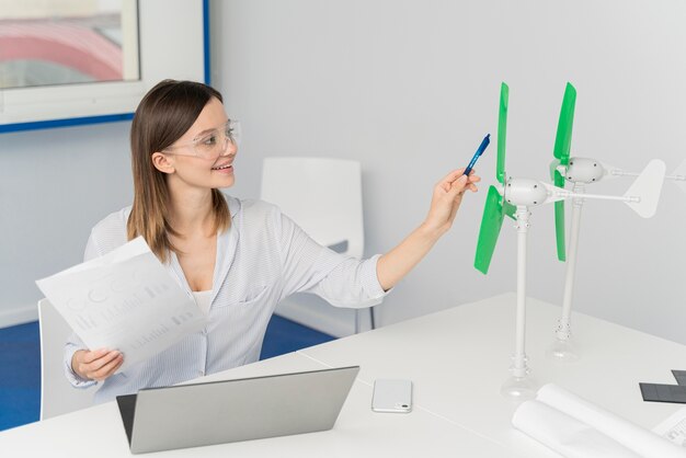 Young woman working on an energy power innovation