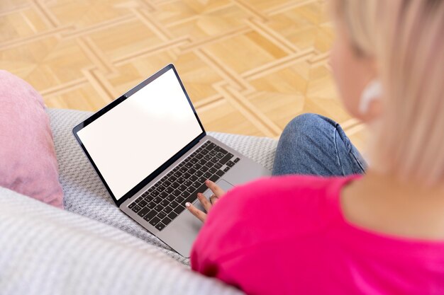 Free photo young woman working from home