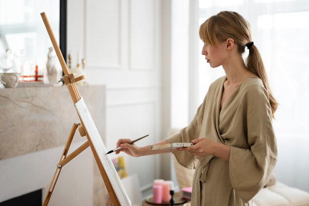 Young woman working in her worshop