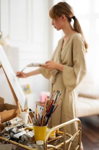 Young woman working in her worshop