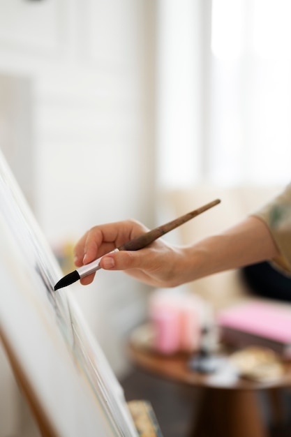 Young woman working in her worshop