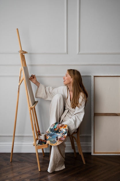 Young woman working in her worshop