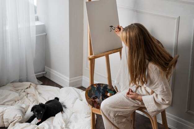 Young woman working in her worshop