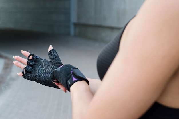 Young woman working out at the street