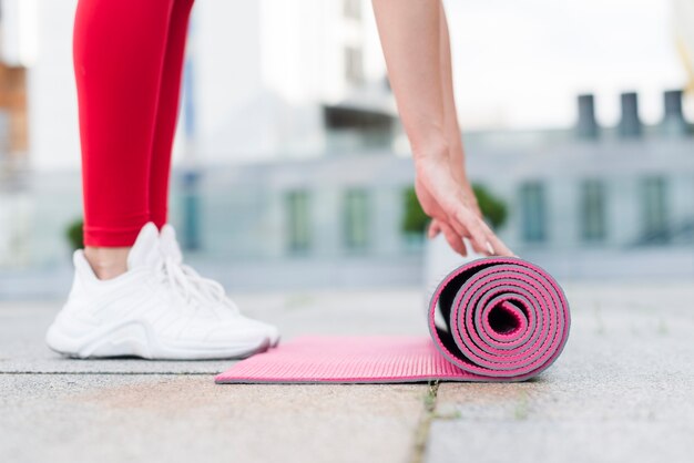 Young woman working out at the street