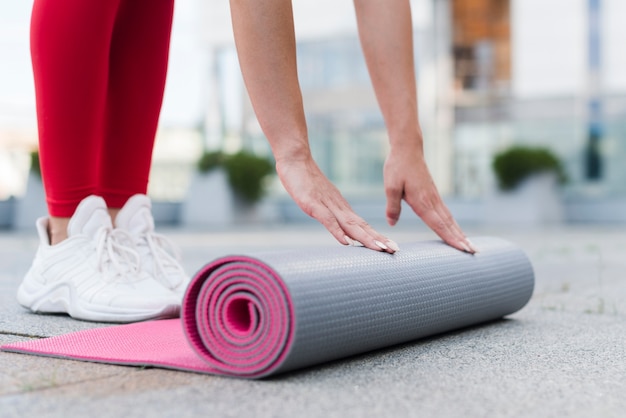 Young woman working out at the street