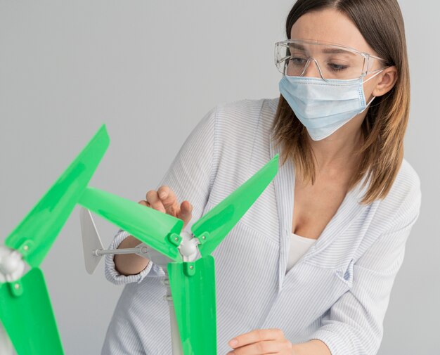 Young woman working on a power saving solution