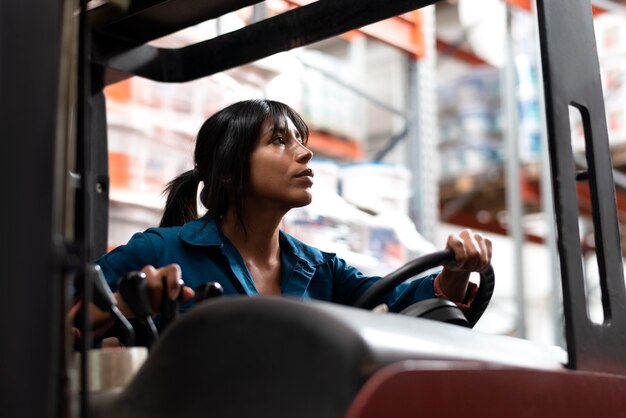 Young woman working in a warehouse