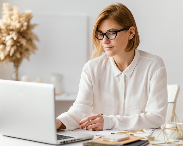 young woman writing a book