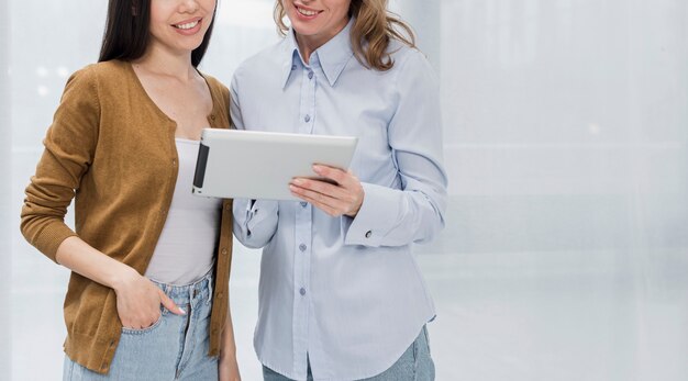 Young women browsing on a tablet