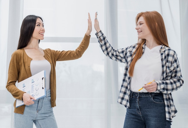 Free photo young women celebrating together