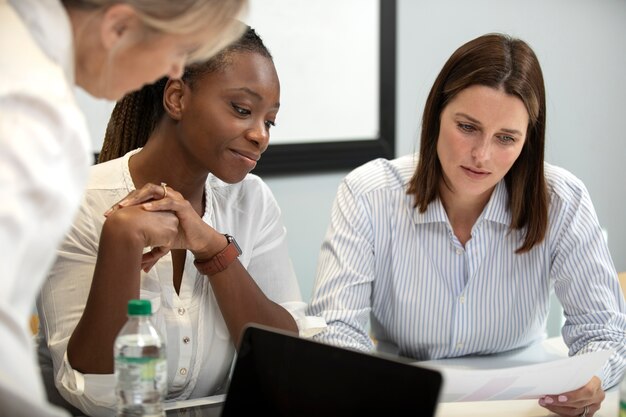 Young women discussing business