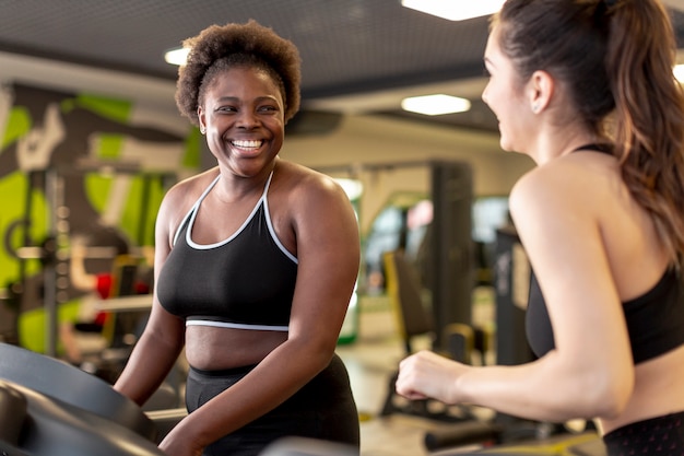 Young women at gym training together