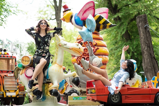 Young women having fun in amusement park