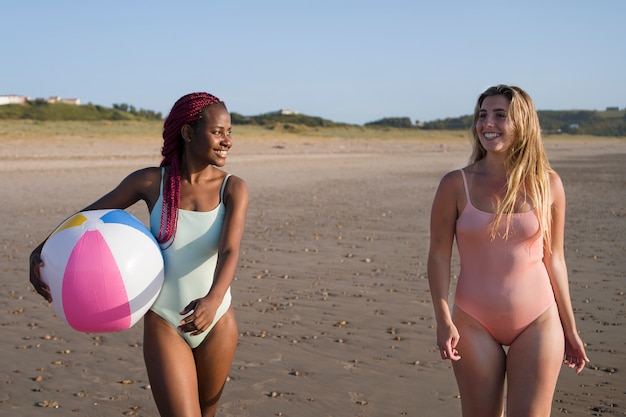 Young women having fun at the beach