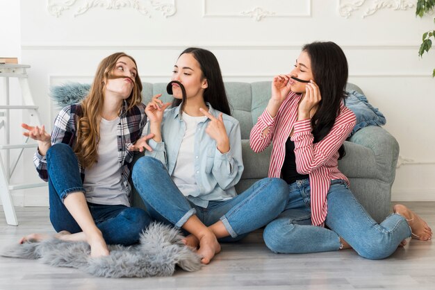 Young women having fun at home