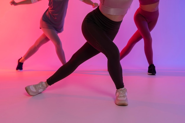 Free photo young women having fun at zumba