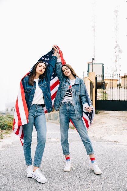 Young women holding flag