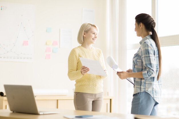 Young women working in office