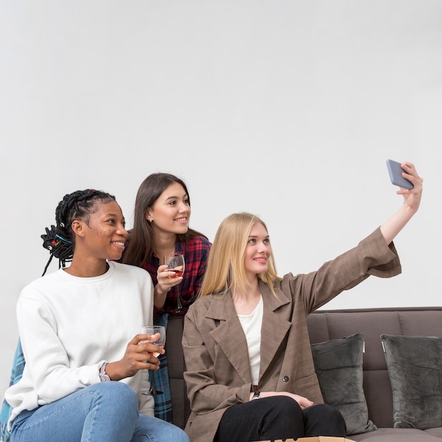 Young womens taking selfies