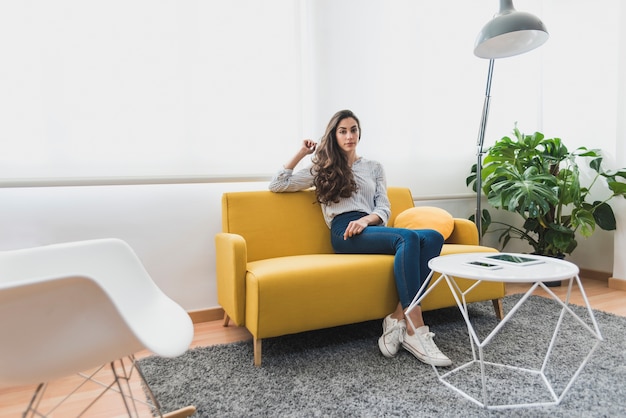 Young worker sitting on the couch