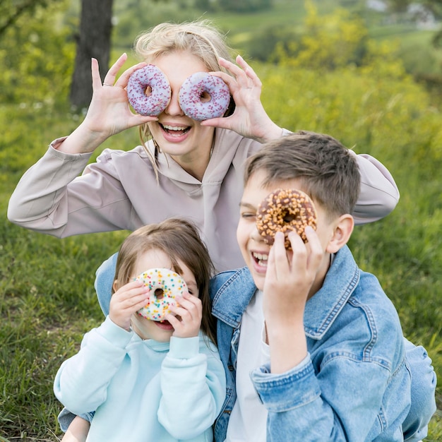 Youngster outdoors and family fooling around