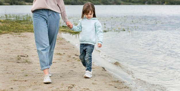 Youngster outdoors and mother