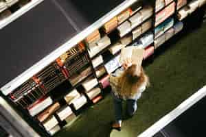 Free photo youngster woman with book