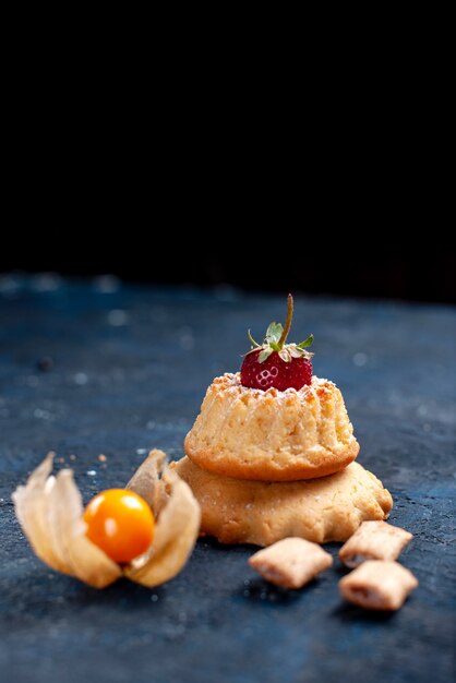 yummy little cake with pillow formed biscuits on blue