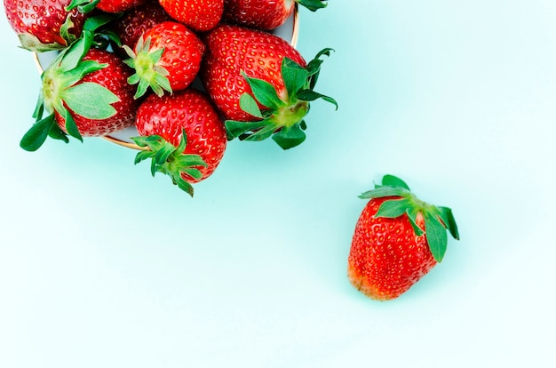 Yummy strawberries on colorful background