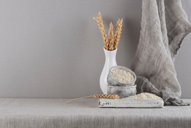 Zakat still life with grains, rice and cloth