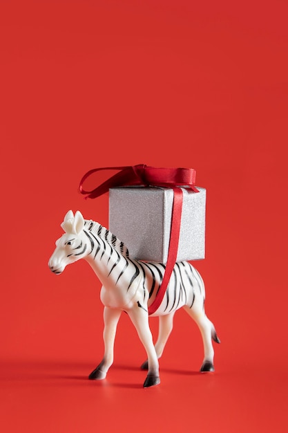 Zebra toy carrying present box