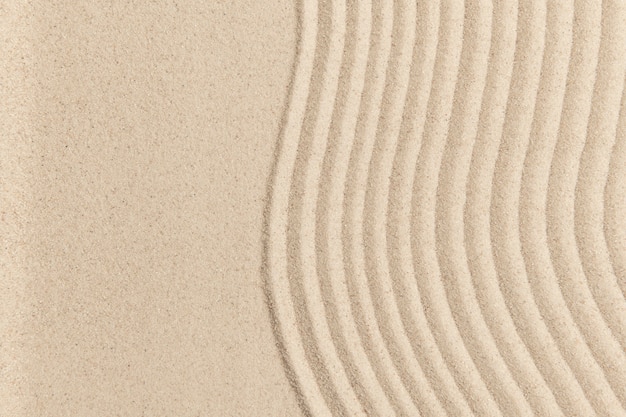 Free photo zen sand wave textured background in health and wellness concept