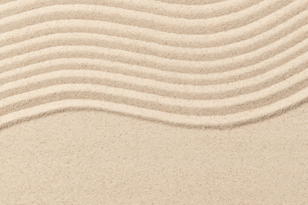 Free photo zen sand wave textured background in wellness concept