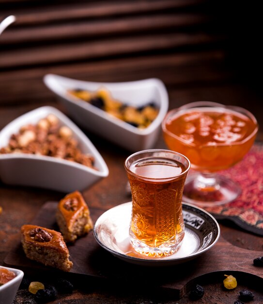 Ð°zeri baklava with walnut and a cup of tea