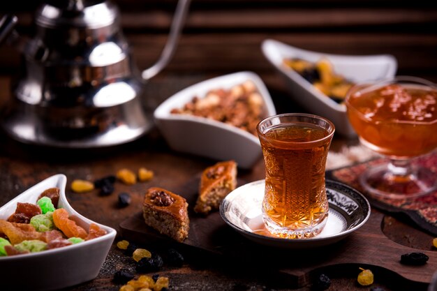 Ð°zeri baklava with walnut and a cup of tea