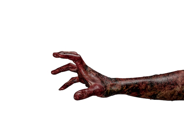 免费照片僵尸的手。万圣节主题的概念。