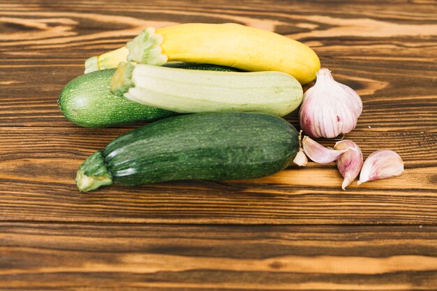 Zucchini and garlic on table