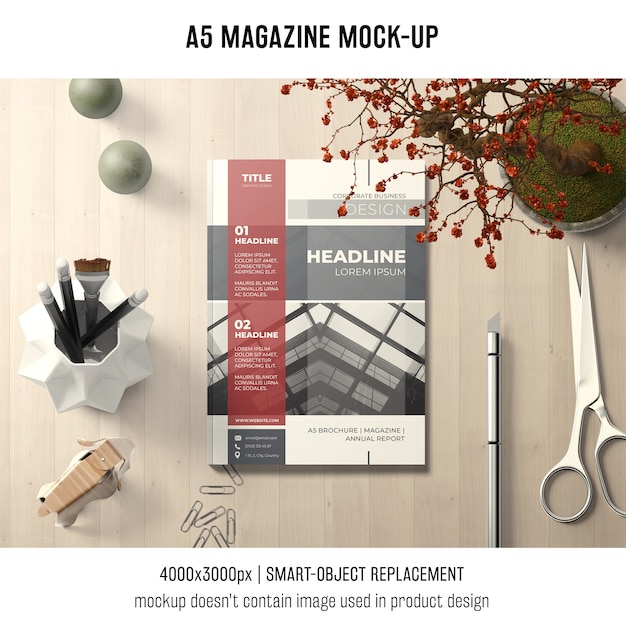 Free PSD a5 magazine mockup with scissors