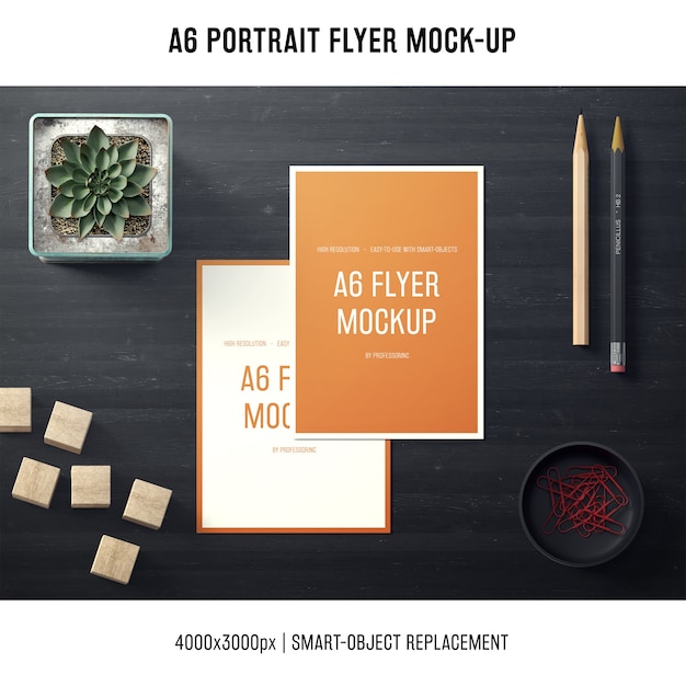 Free PSD a6 portrait flyer mock-up with pencils