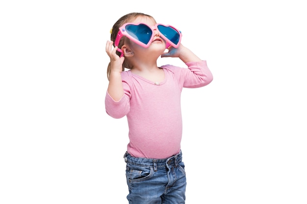 Adorable girl with heart shaped glasses