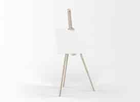 Free PSD art canvas in an easel isolated on white