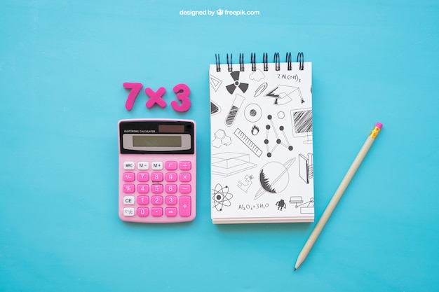 Back to school composition with notepad and calculator