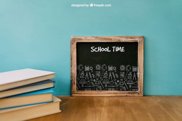 Free PSD back to school composition with slate and books