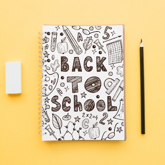 Back to school mockup with notebook cover